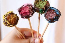 These Vegan Rainbow Cake Pops are delicious gluten free healthy treats for kids and adults alike that can be made in a rainbow of colours and decorated with little sprinkles and candies!