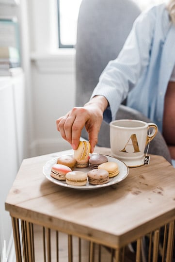 person sitting at a side table eating food