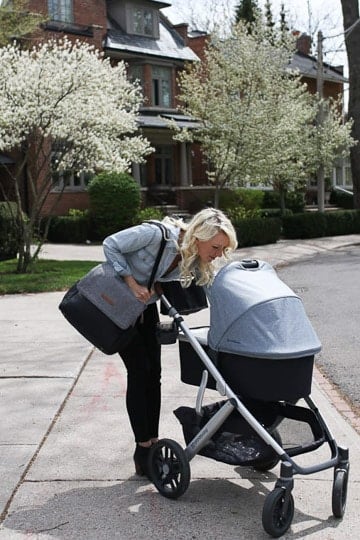 abbey looking into a stroller