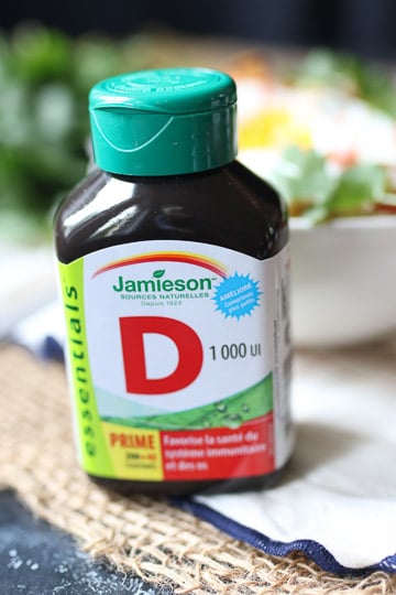 close up of a bottle of vitamin D supplements 