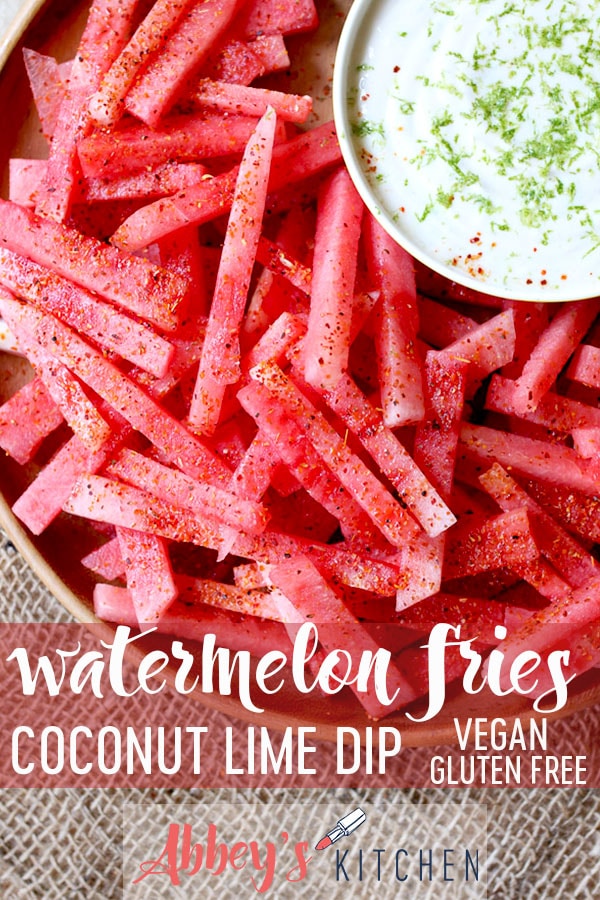 Watermelon fries sprinkled with tajin next to dip.