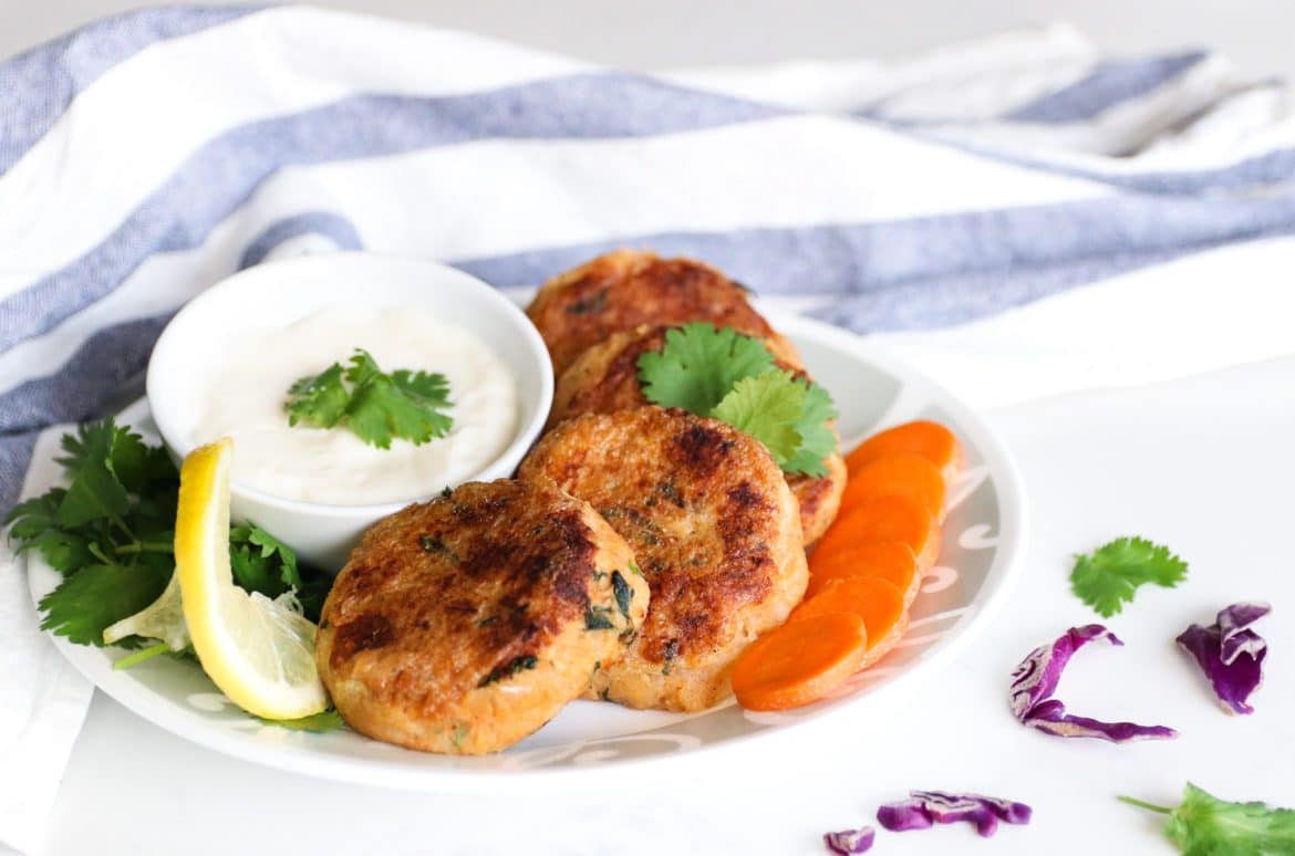 Tuna patties on a white plate. 