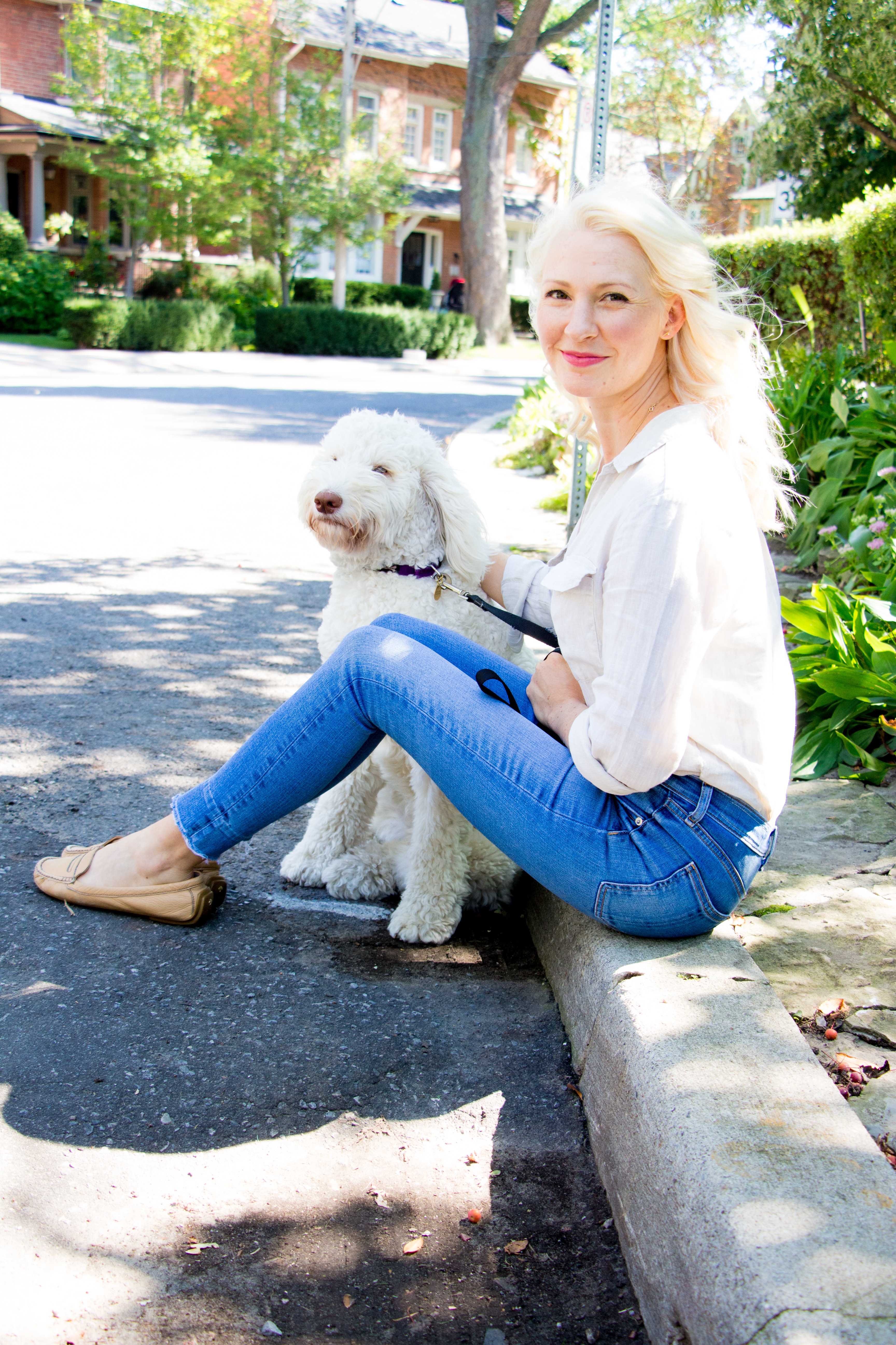 abbey sitting on the curb with poppy