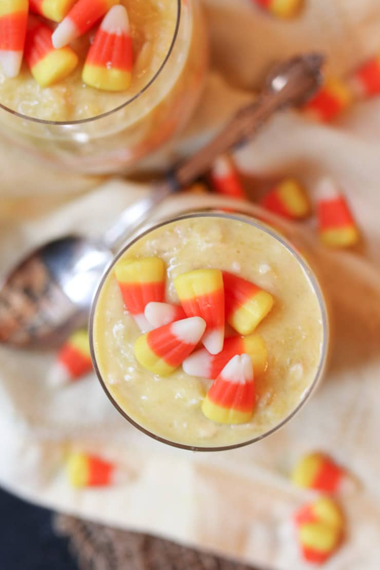 Birds eye view of candy corn flavoured overnight oats topped with candy corn