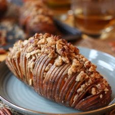 Try my Vegan Gluten Free Hasselback Sweet Potatoes with Streusal Topping as a holiday side dish. #abbeyskitchen #sweetpotatoes #hasselbackpotatoes #streusal #holidaysidedish #holidays #holidaydinner #vegansidedish #glutenfreefood #potatoes #healthysidedish