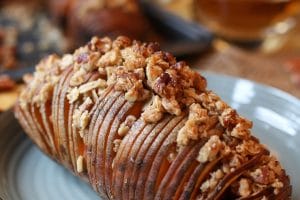 Try my Vegan Gluten Free Hasselback Sweet Potatoes with Streusal Topping as a holiday side dish. #abbeyskitchen #sweetpotatoes #hasselbackpotatoes #streusal #holidaysidedish #holidays #holidaydinner #vegansidedish #glutenfreefood #potatoes #healthysidedish