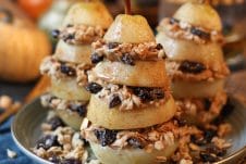 These Vegan Granola Layered Poached Pears are a delicious dairy free, gluten free, healthy, and easy holiday dessert for entertaining friends with diet restrictions!