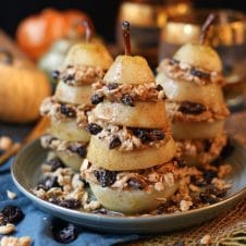 These Vegan Granola Layered Poached Pears are a delicious dairy free, gluten free, healthy, and easy holiday dessert for entertaining friends with diet restrictions!