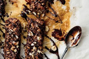 These Gluten Free Vegan Chocolate Hazelnut Granola Bars make the perfect 3 PM snack and are so easy to prepare. These nutritious bars taste like Ferrero Rocher chocolates and make the perfect hostess gift!