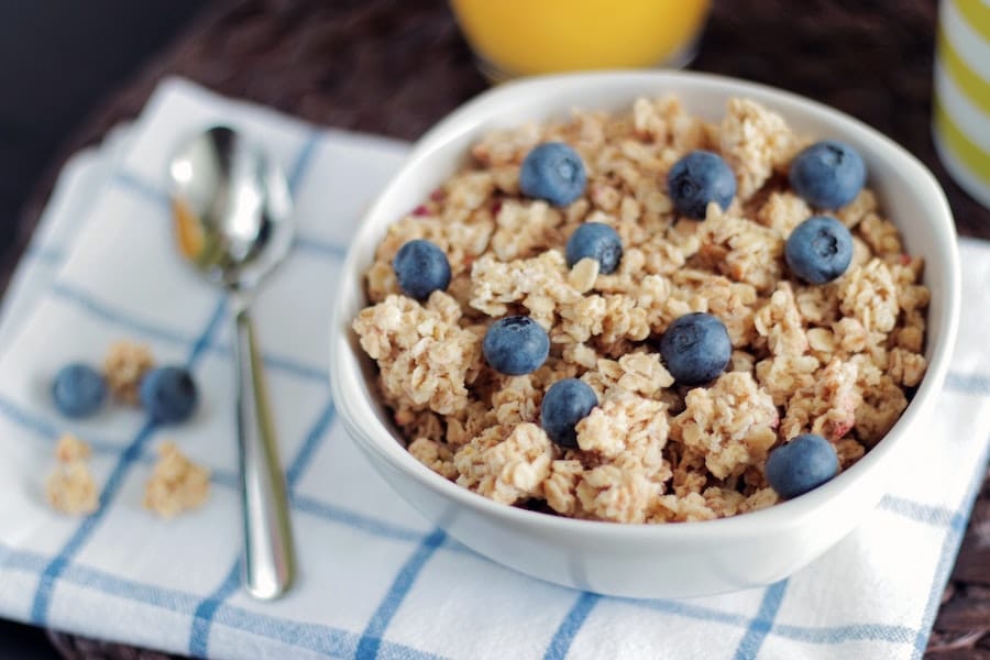 Oatmeal in a bowl with blueberries.