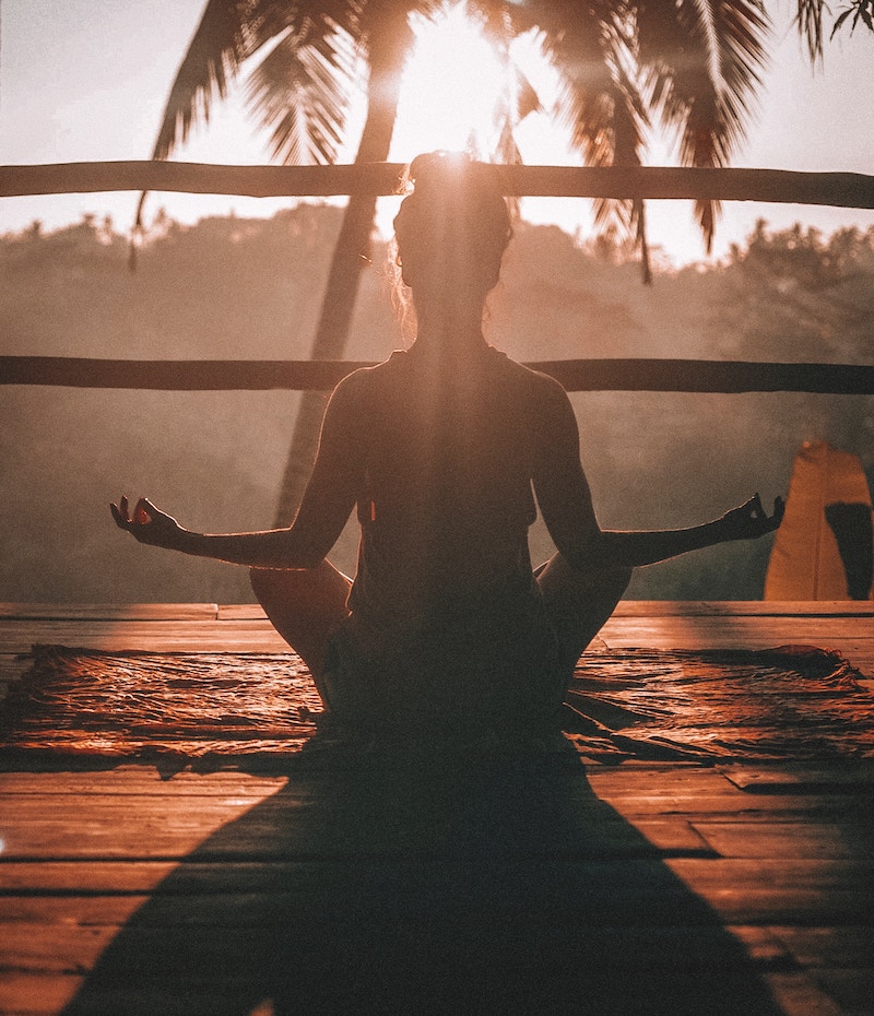 person doing yoga outside