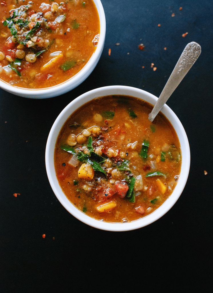 birds eye view of vegan Lentil soup served in two white bowls.