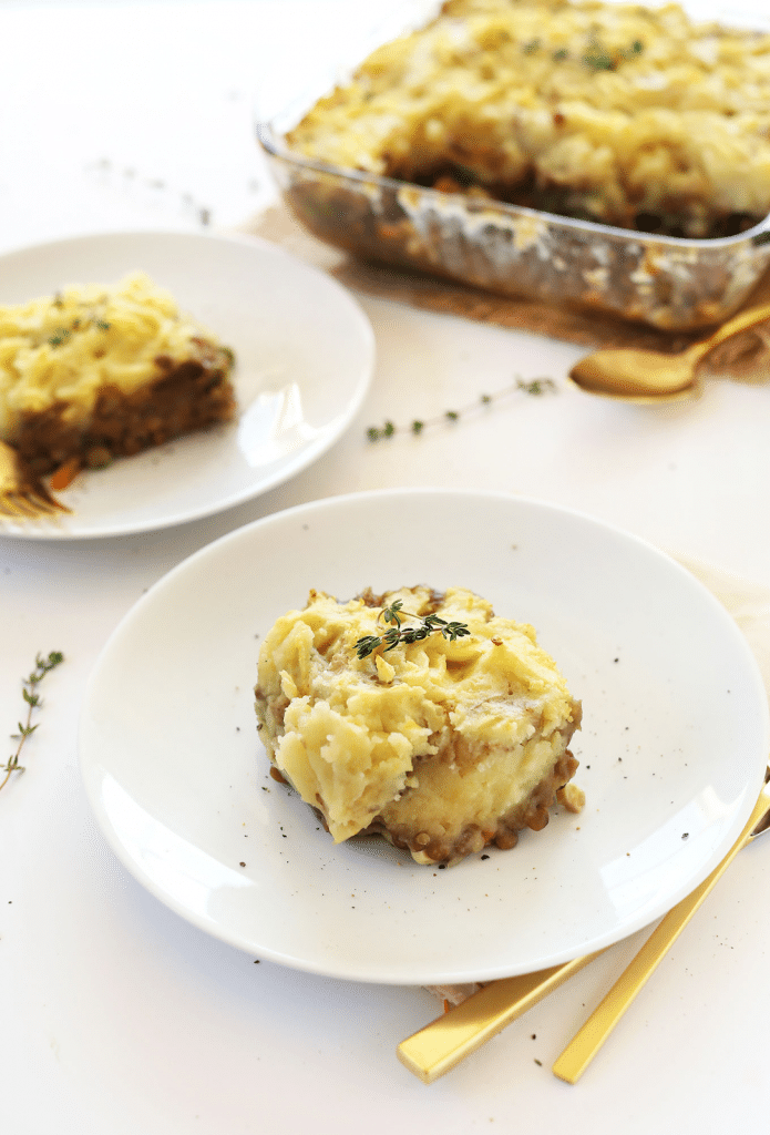 Vegan christmas casserole served on a white plate.