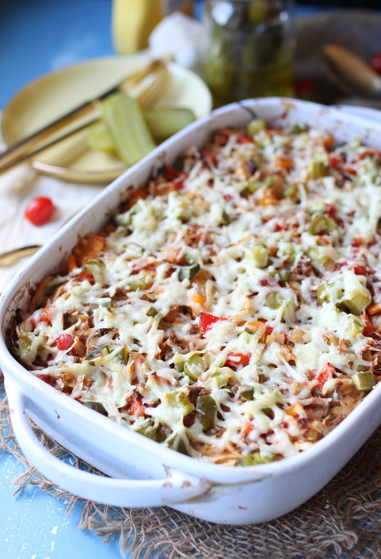 Cheeseburger casserole in a white dish.