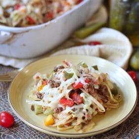 Craving a cheeseburger but trying to avoid your local fast food joint? This Keto Friendly Low Carb Cabbage Cheeseburger Casserole is a lightened up version that doesn't skimp on the pickles.