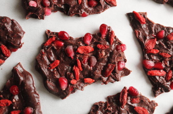 close up image of vegan antioxidant chocolate bark on parchment paper