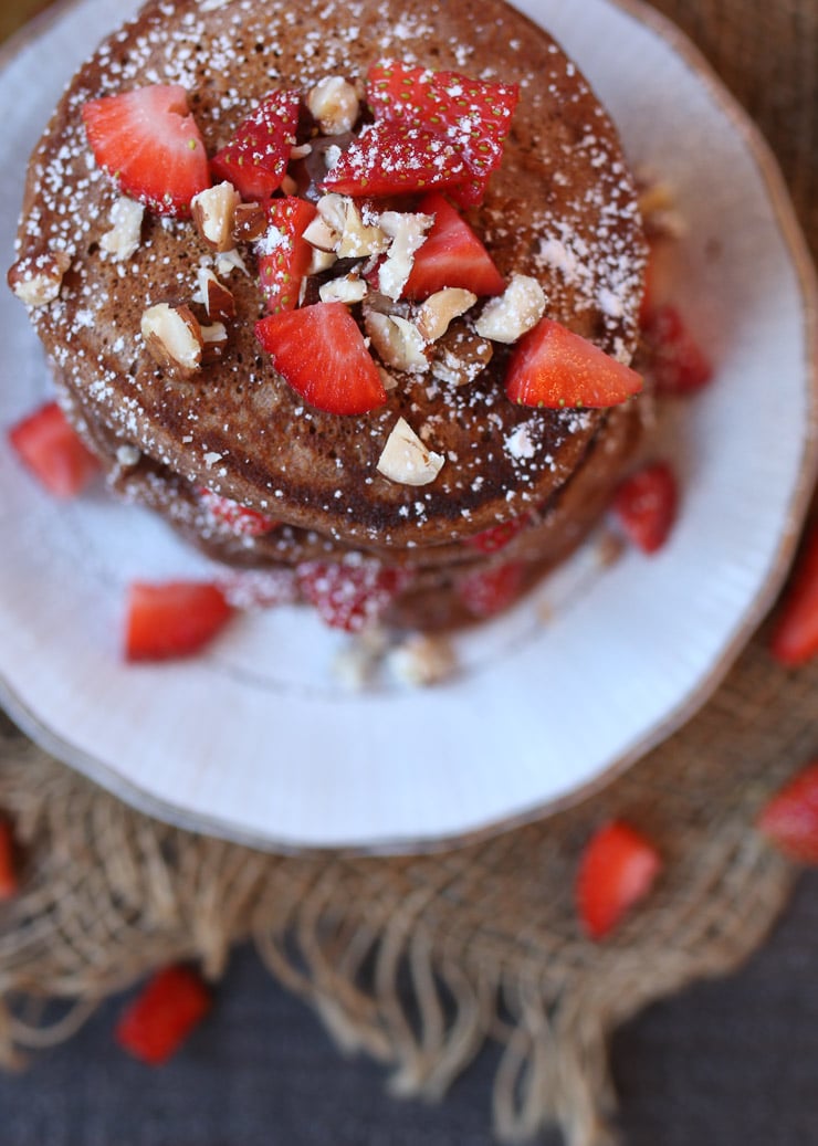 These Vegan Nutella Protein Pancakes make a delicious Healthy Gluten Free Valentine's Day Breakfast Recipe for a plant-based breakfast in bed!