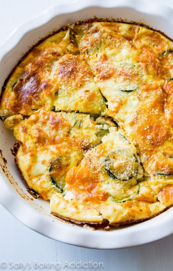 Veggie crustless quiche in a white casserole dish from family meal plan.