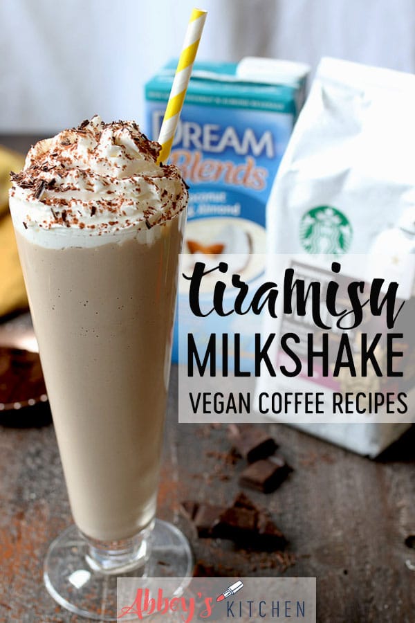 pinterest image of Vegan tiramisu milkshake in a tall glass topped with whip cream with whipped cream.