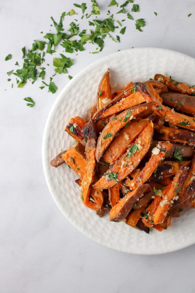 Sweet potato fries on a white plate from family meal plan.