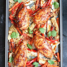 Four sticky chicken breast sheet pan dinner with cabbage and peppers.