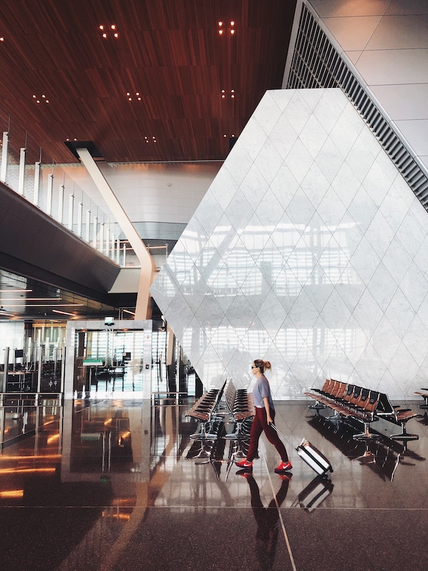 person walking in a large building