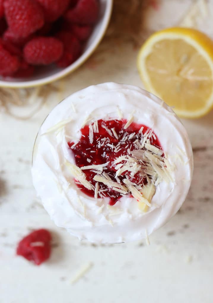 Vegan lemon mousse parfait topped with vegan whip cream.