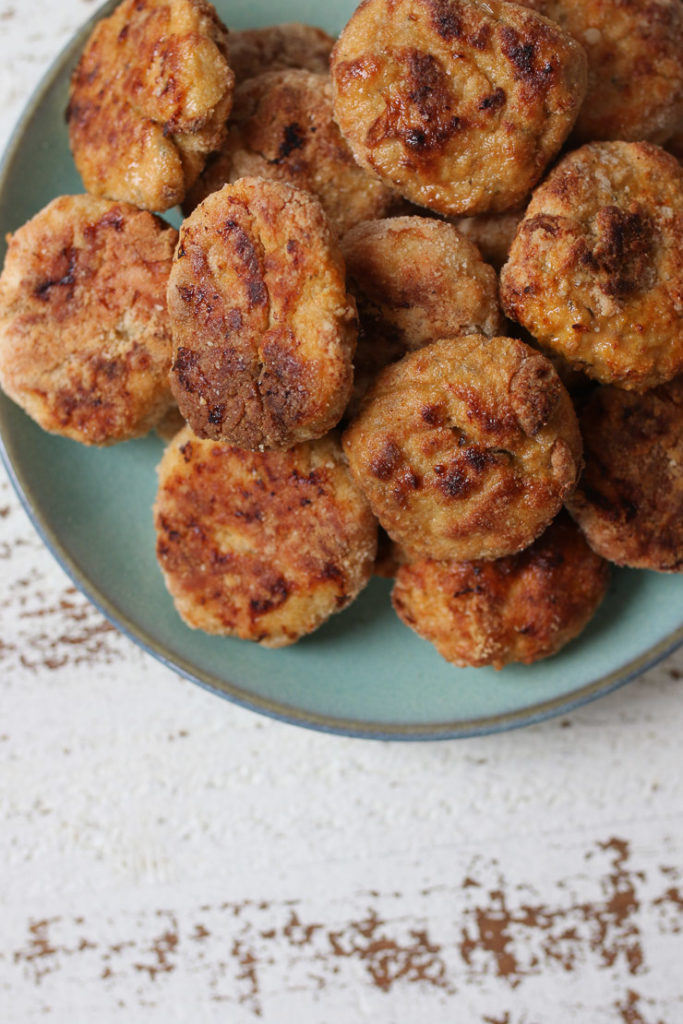 Better than McDonalds chicken nuggets on a turquoise plate.