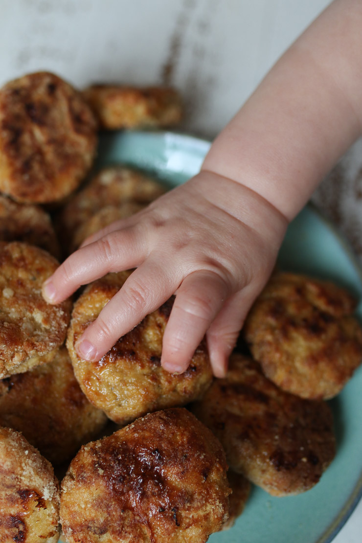 Baby's hand holding better than McDonalds chicken nuggets.