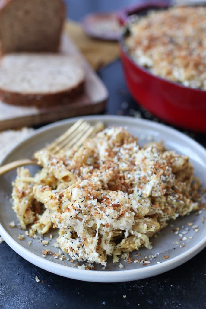 Everything bagel vegan mac and cheese served on a grey plate.