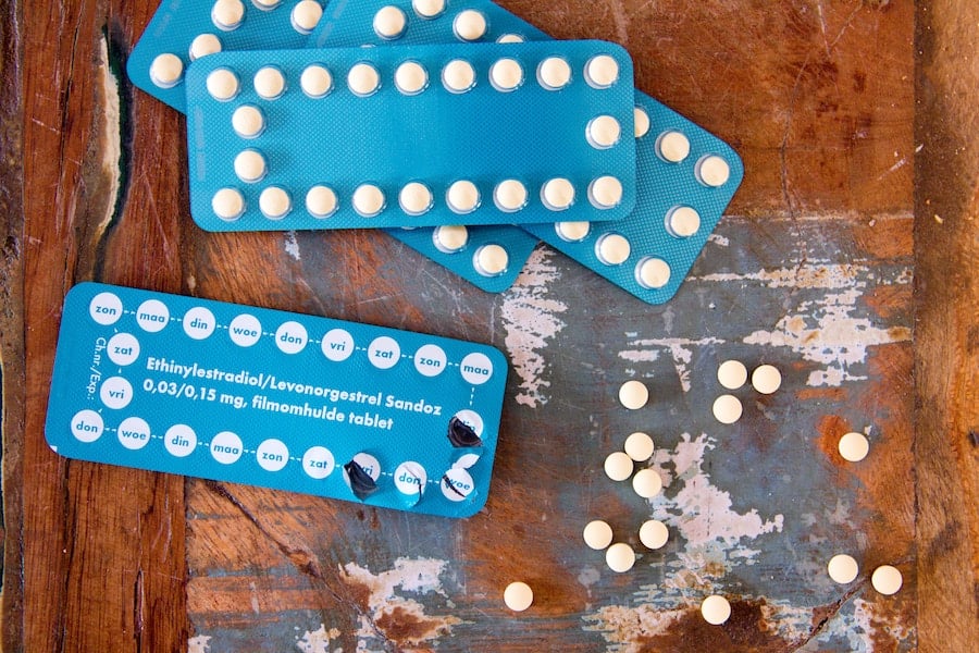 Multiple packages of birth control pills.