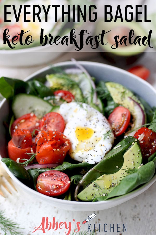 pinterest image of Keto salad topped with poached egg, smoked salmon and avocados in a bowl with text overlay