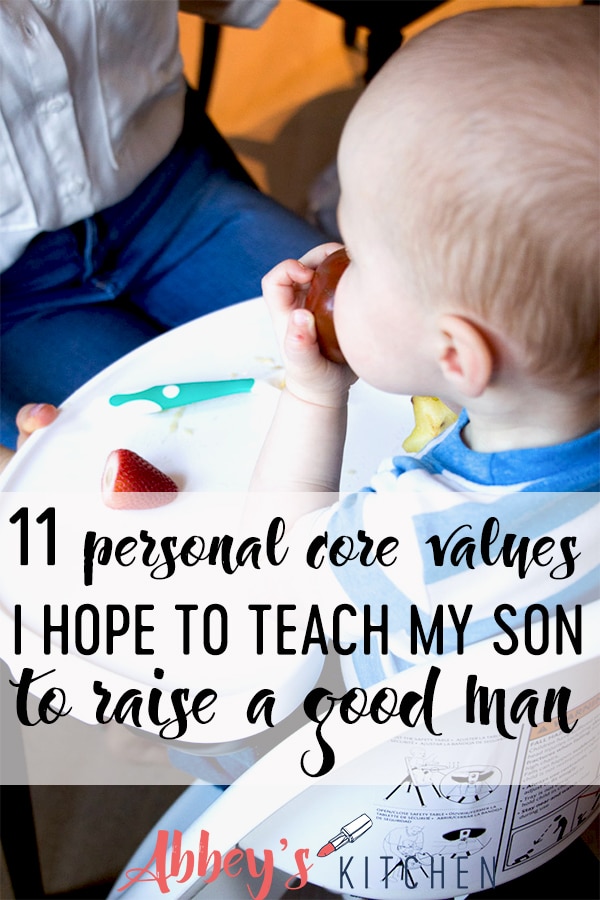 pinterest image of Baby boy sitting in a high chair eating a tomato with text overlay