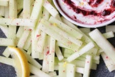 Honeydew melon fries next to poppyseed cherry dip.