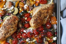 Greek chicken on a sheet pan with roasted veggies