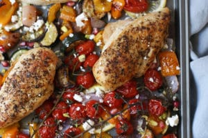 Greek chicken on a sheet pan with roasted veggies