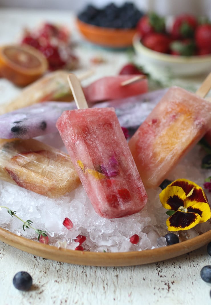 Plate of real fruit popsicles.