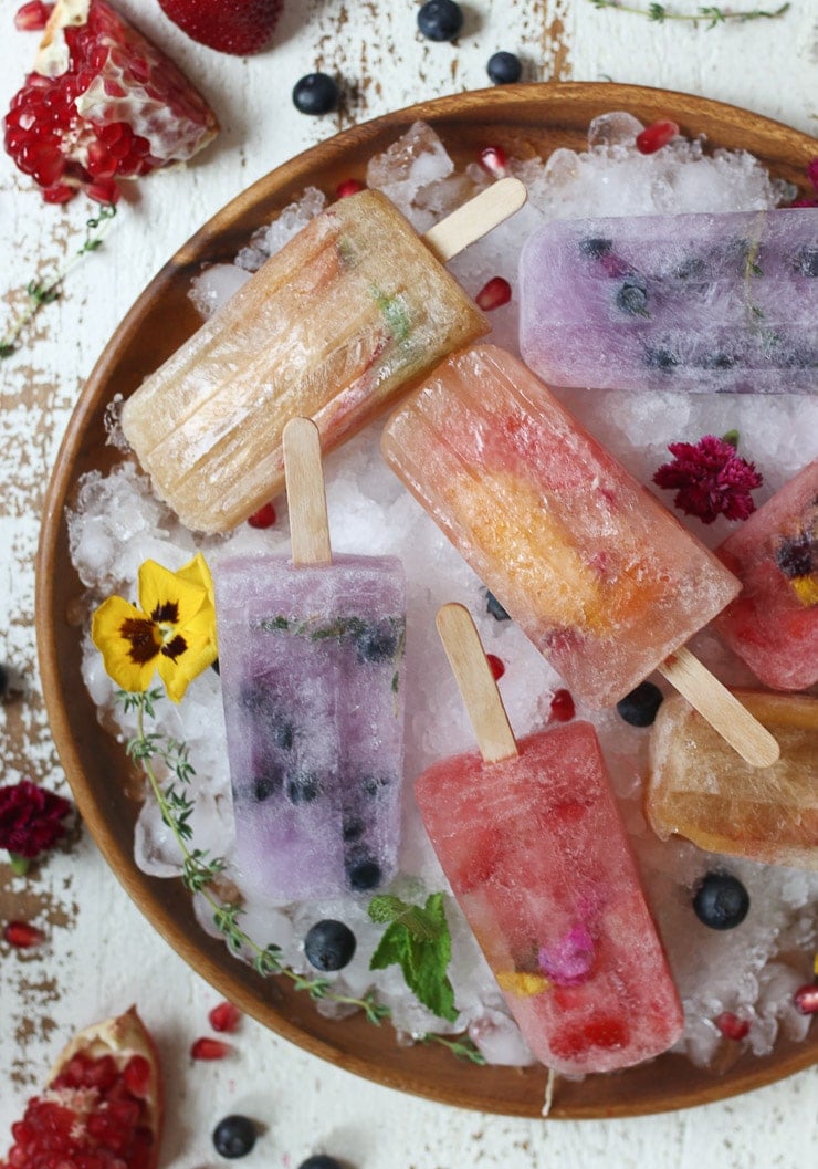 Plate of real fruit popsicles made with kombucha.