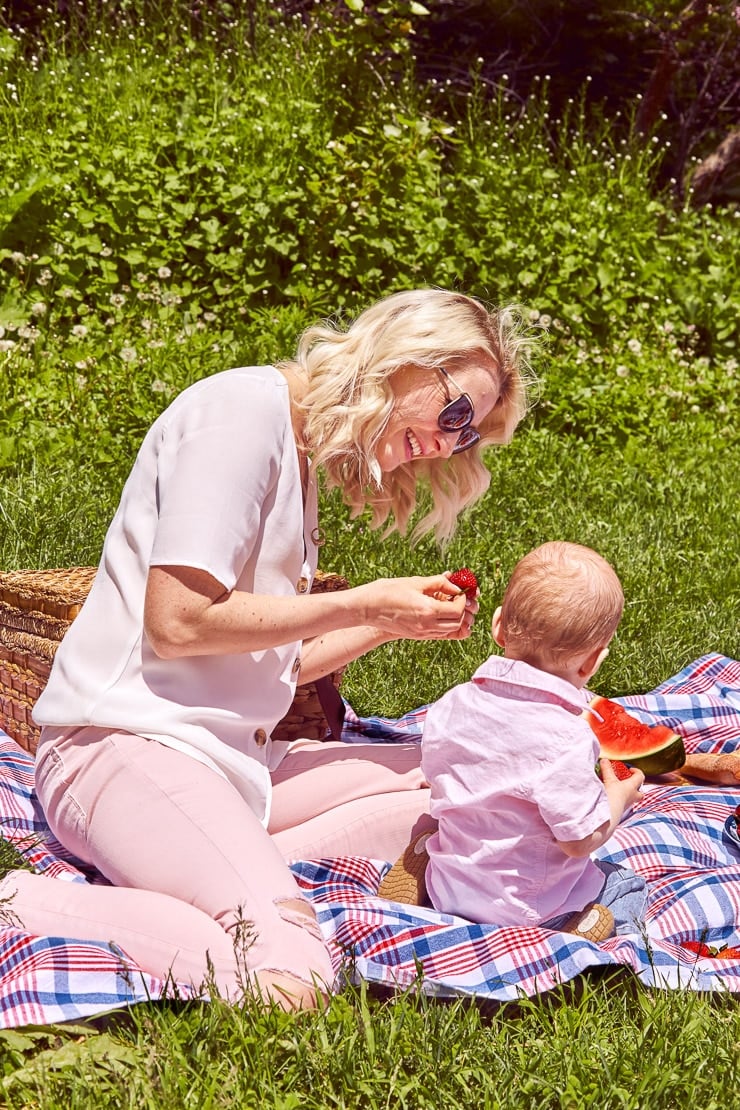 Abbey having a picnic with her baby.