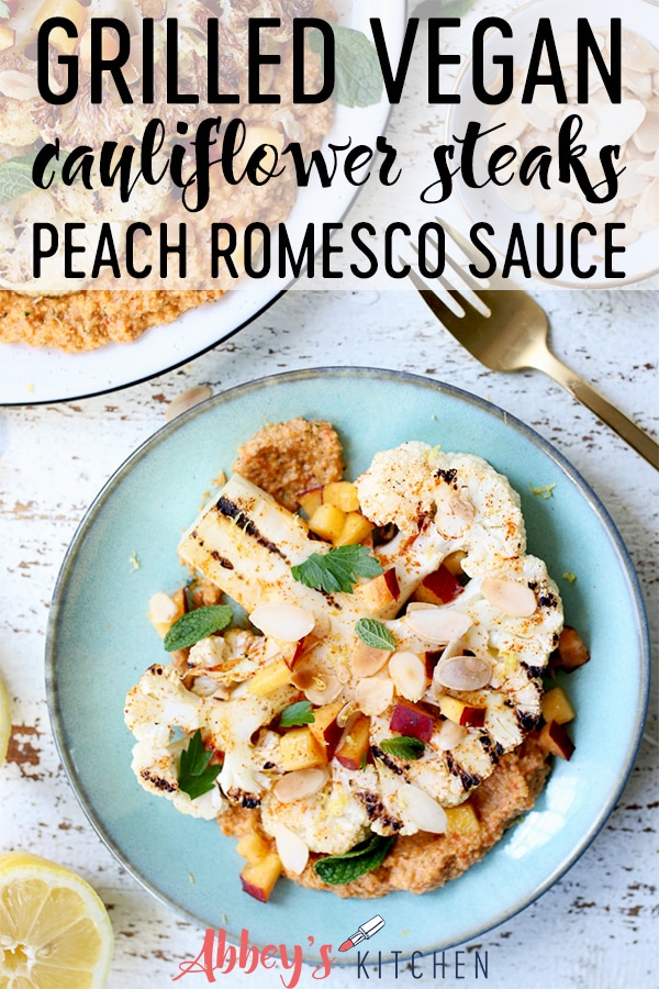 pinterest image of cauliflower steak topped with peach romesco sauce with text overlay