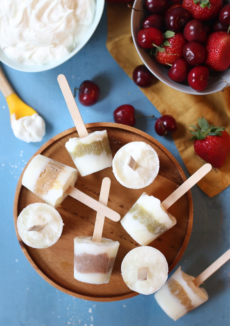 Baby popsicles on a wooden plate