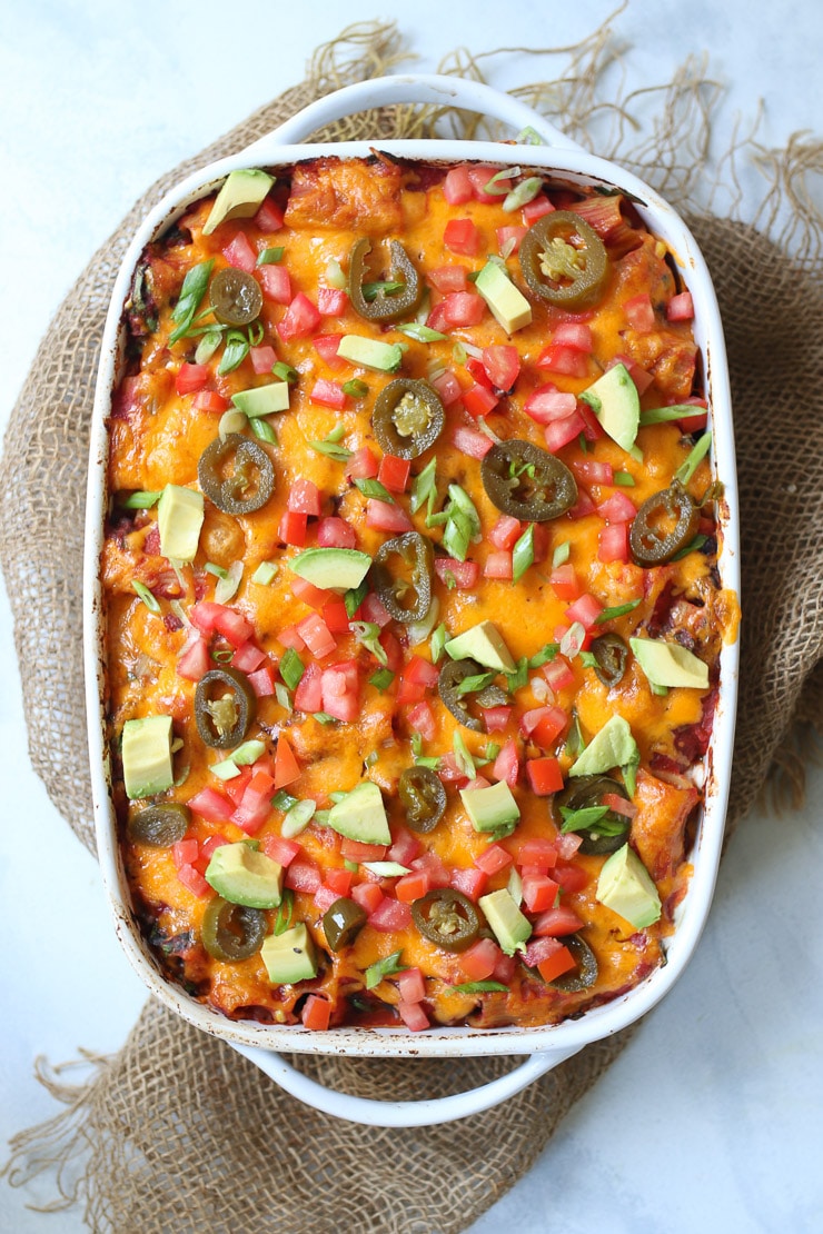 Mexican casserole in a large white dish. 