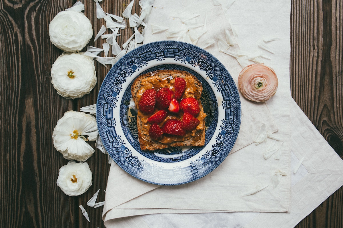 toast with peanut butter and berries