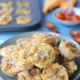 Mac and cheese bites on a blue plate.