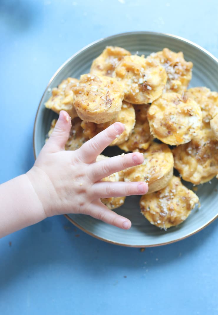 Baby grabbing a mac and cheese bite