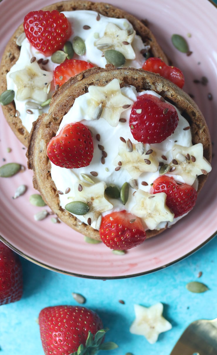 Waffle topped with yogurt, strawberries and banana