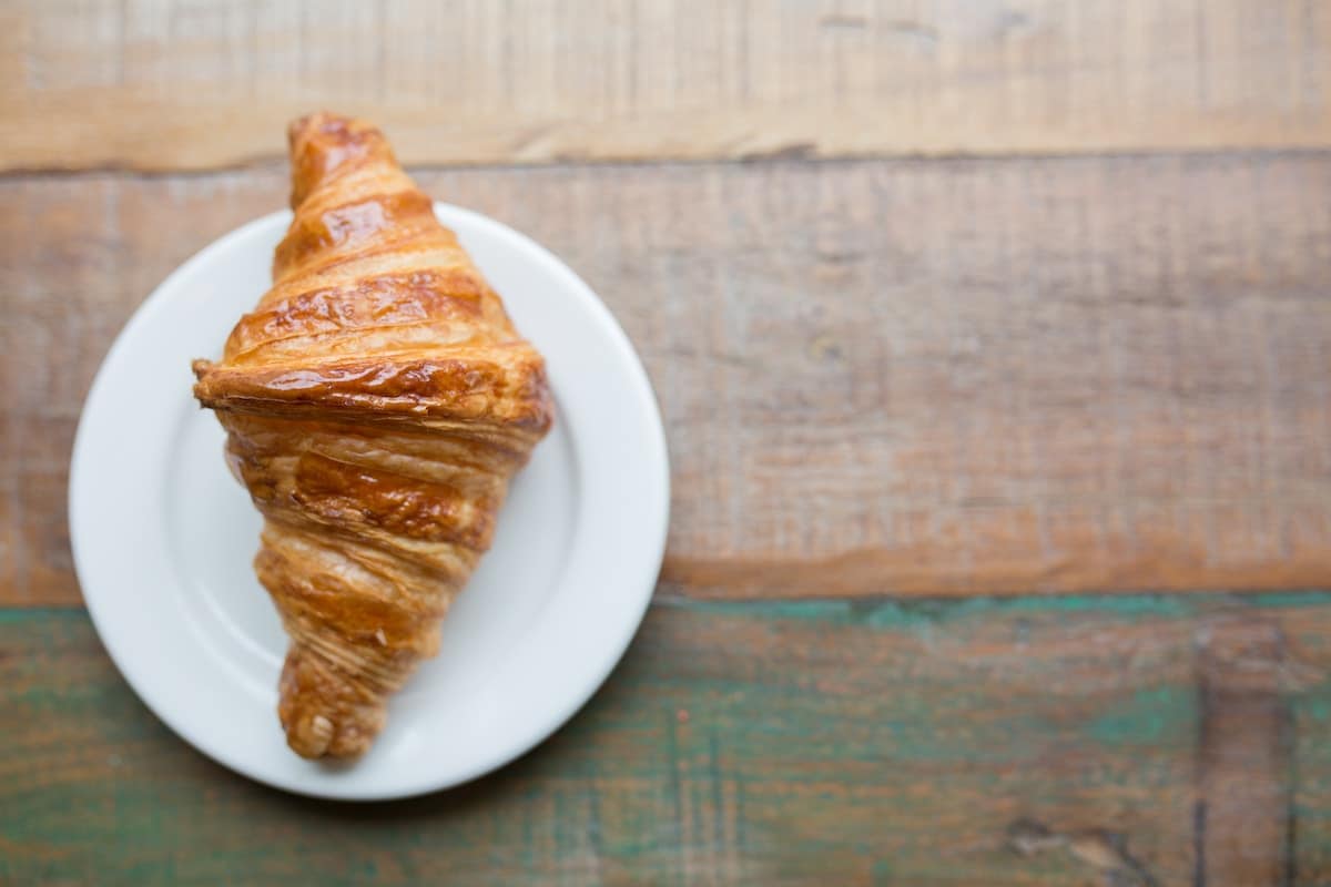 Croissant on a white plate