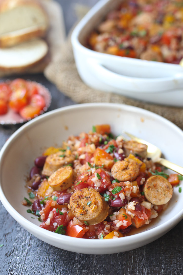 Cajun rice cauliflower in a white bowl.