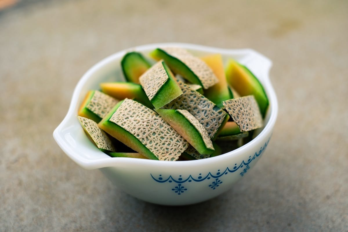 Bowl of sliced melon.