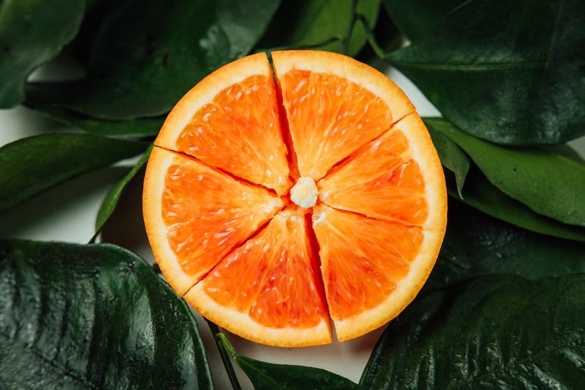 Half an orange cut into segments